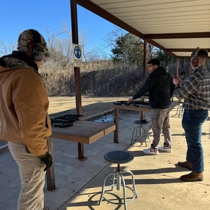Group class in session at the outdoor covered range
